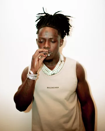 Balenciaga Grey & Black Lo­go Tank Top worn by Jack Boy on his Instagram account @1804jackboy