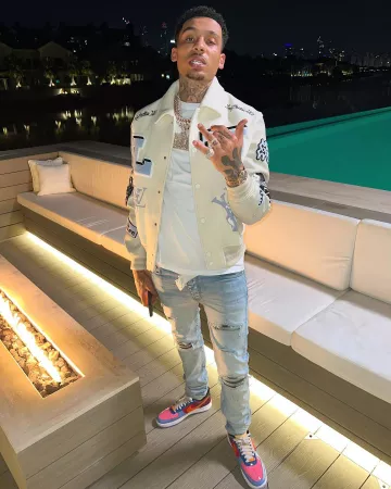 Louis Vuitton White & Light Blue Varsity Jacket porté par Fredo sur son compte Instagram @fredo
