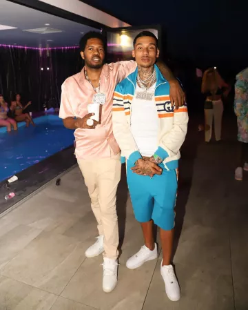 Gucci Turquoise, Orange, & White Track Jacket worn by Fredo on his Instagram account @fredo