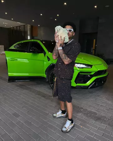 Rhude Black Tortoiseshell Swim Shorts porté par NoCap sur son compte Instagram @thebackendchild