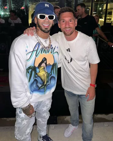 Amiri White, Turquoise, & Navy Bone Runner Sneakers worn by Anuel AA on his Instagram account @anuel