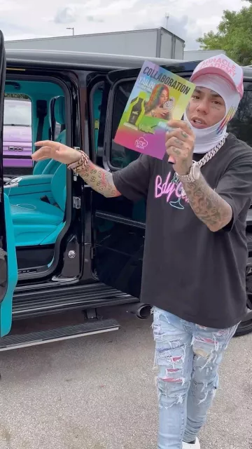 Amiri Clay Indigo & Rainbow Bandana Jeans worn by 6ix9ine on his Instagram account @6ix9ine