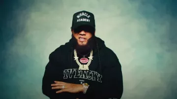 Givenchy Black Outlined College Logo Hoodie worn by El Alfa in Te Estudiamos by DYLAN ✖️ EL ALFA [Video Oficial]