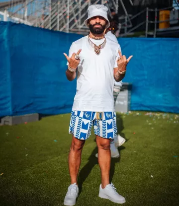 Rhude White & Blue Chevron Swim Shorts worn by Arcángel on his Instagram account @arcangel