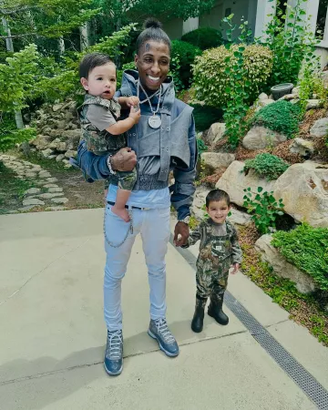 SXVSU Grey Layered Commencement Denim Hoodie worn by YoungBoy Never Broke Again on the Instagram account @nba_youngboy