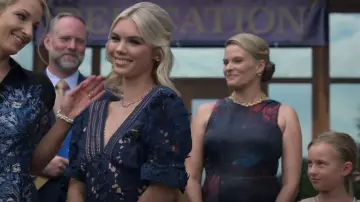 Adelyn Rae V-Neck Short Puff Sleeve Open Back Detail Illusion Crochet Lace Ruffle Hem Mini Dress worn by Amber (Caroline Elizabeth Gregory) as seen in Swagger (S02E02)