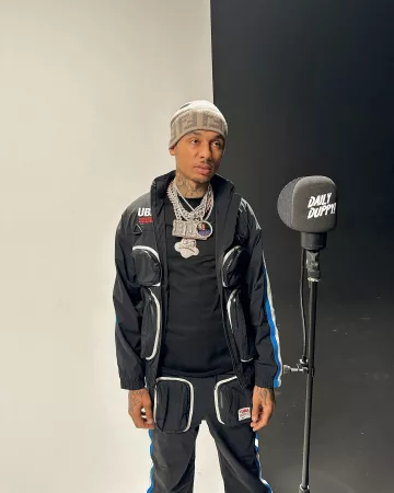 Nike x Undercover Black Cargo Trackpants worn by Fredo on his Instagram account @fredo