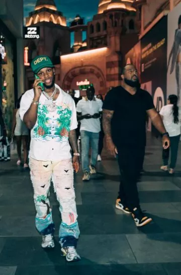 Rhude White Palm Print Snap Shirt worn by Toosii on his Instagram account @toosii