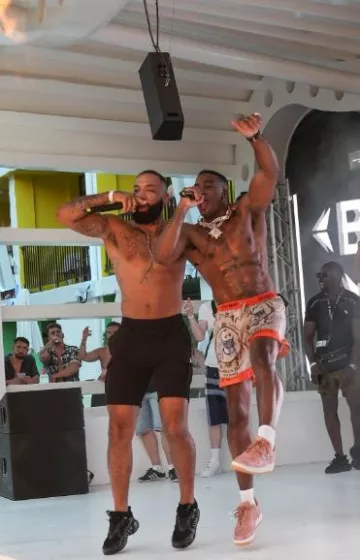 Amiri x Zig Zag Beige & Orange Silk Shorts worn by Bugzy Malone on his Instagram account @thebugzymalone