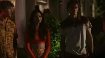 Marine Layer Nicasio Short Sleeve Striped Polo In Sunset Stripe worn by Conrad (Christopher Briney) as seen in The Summer I Turned Pretty (S02E06)