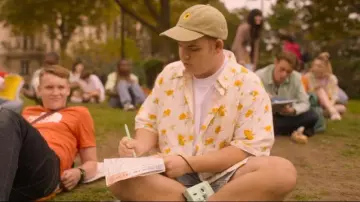 Reclaimed Vintage Inspired Broderie Ox­ford Shirt in Flo­ral Print worn by Isaac Henderson (Tobie Donovan) as seen in Heartstopper (S02E05)