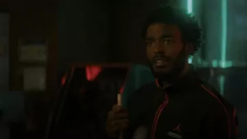 Jordan M J Why Not? Fac­etasm Track Jack­et worn by Trig Taylor (Luke James) as seen in The Chi (S04E05)