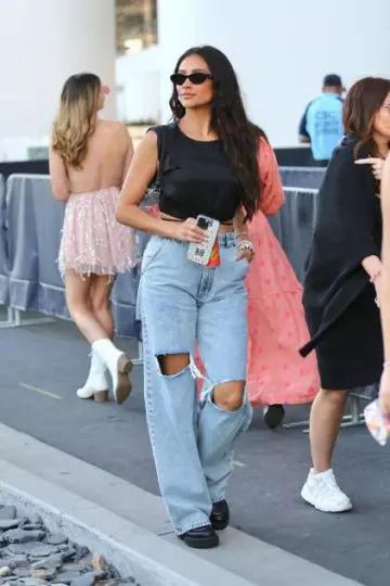 Prada Triangle Crystal Embellished Bag worn by Shay Mitchell Taylor Swift in Eras Tour on August 5, 2023