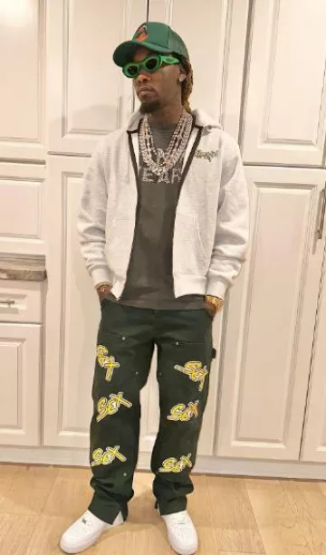 Bottega Veneta Green Two Tone Hue Sun­glass­es worn by Offset on his Instagram account @offsetyrn