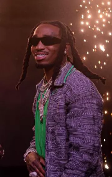 Chaqueta de pista tejida moteada gris Bottega Veneta usada por Quavo en la cuenta de Instagram @quavohuncho