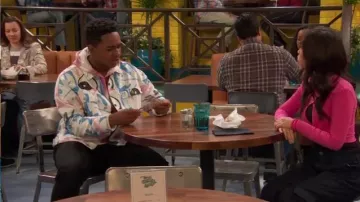 Asos Den­im Jack­et with Graf­fi­ti Print in White worn by Booker Baxter (Issac Ryan Brown) as seen in Raven's Home (S06E12)