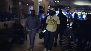 Rhude White Hotel De Rhude T Shirt worn by EST Gee in A MOMENT WITH GOTTI (Official Music Video) with Yo Gotti