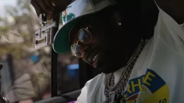 Rhude White Satin Palm Tree Trucker Hat worn by EST Gee in A MOMENT WITH GOTTI (Official Music Video) with Yo Gotti