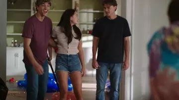 Levi's 501 Medium Wash High-Rise Cutoff Denim Shorts worn by Belly (Lola Tung) as seen in The Summer I Turned Pretty (S02E07)
