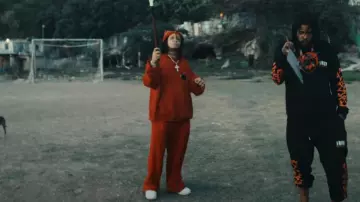 Balenciaga Red Velvet Wide Leg Pants worn by Trippie Redd in Trippie Redd – Helicopter (feat. Tommy Lee Sparta) (Official Music Video)