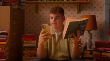 Asos Design Oversized Knitted Button Through Polo in Washed Green worn by Isaac Henderson (Tobie Donovan) as seen in Heartstopper (S02E08)