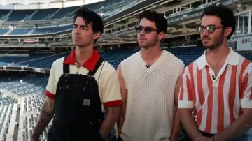 Carhartt Men's Loose Fit Firm Duck Bib Overall worn by Joe Jonas as seen in Today on August 14, 2023