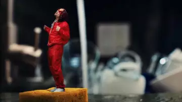 Salvatore Ferragamo Red Ny­lon Tech Pants worn by Trippie Redd in Closed Doors (Music Video) with Roddy Ricch