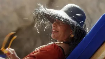 One Last Bali Fringe Palm Hat worn by Seema Patel (Sarita Choudhury) as seen in And Just Like That… (S02E11)