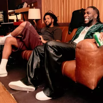 Fear of God White Slip On 101 Sneak­ers worn by J. Cole on the Instagram account @thejcolebible