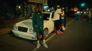 New Balance 550 x Aime Leon Dore White Green sneakers worn by Dave in Meridian music video by Tiakola x Dave