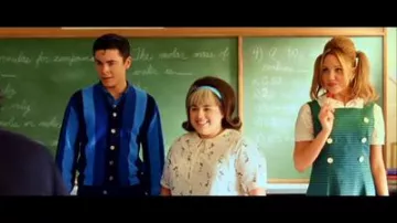 Hairspray Movie Clothing: Penny Pingleton (Amanda Bynes) is wearing Green Dress with White Shirt and Buttons