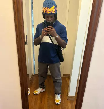 Carhartt Navy & White Stripe Terry Polo worn by Denzel Curry on his Instagram account @denzelcurryph