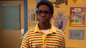 Striped Yellow Polo Shirt worn by Simon 'Cookie' Nelson-Cook (Daniel Curtis Lee) in Ned's Declassified School Survival Guide (S03E07)