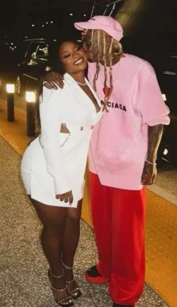 Balenciaga Red Velvet Wide Leg Pants worn by Lil Wayne on the Instagram account of @liltunechi