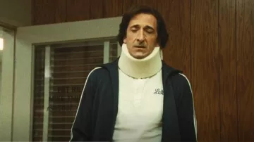 Adidas Originals Beck­en­bauer Track Jack­et worn by Pat Riley (Adrien Brody) as seen in Winning Time: The Rise of the Lakers Dynasty (S02E04)
