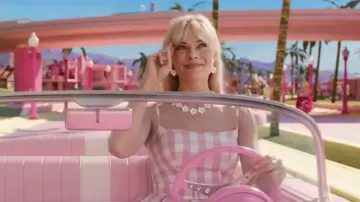 White Flowers earrings and necklace set worn by Barbie (Margot Robbie) as seen in Barbie movie