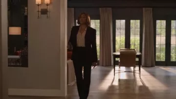 L'Agence Mar­ty Flared Trousers worn by Danner (Tiffany Haddish) as seen in The Afterparty (S02E10)