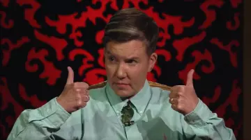 Polo Ralph Lauren Slim Fit Stretch Po­lo Shirt worn by Karen O'Leary as seen in Taskmaster NZ (S04E08)