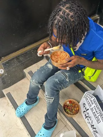 Crocs Clas­sic Clogs Light Blue worn by Killy Milly on his Instagram account @russmillions