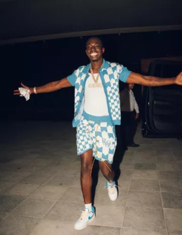 Rhude White & Blue Racing Checkered Shorts worn by Bobby Shmurda on his Instagram account @itsbobbyshmurda