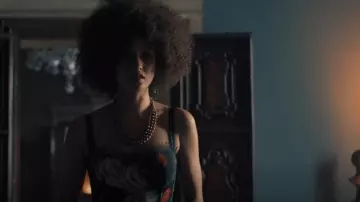 Dolce & Gabbana Flo­ral Print­ed Busti­er Mi­di Dress worn by v as seen in A Discovery of Witches (S01E02)