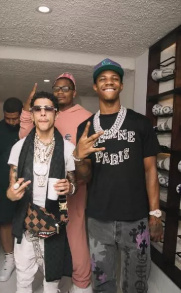 Chrome Hearts Pur­ple & Green CH Hat worn by A Boogie wit da Hoodie on his Instagram account @aboogievsartist