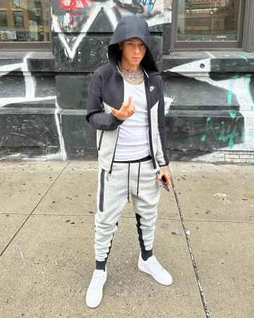 Nike Black & Grey Windrunner Zip Hoodie worn by Central Cee on his Instagram account @centralcee