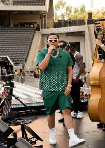 Louis Vuitton Green Monogram Swim Shorts porté par Jesus Ortiz Paz sur son compte Instagram @jesusortizpazfr