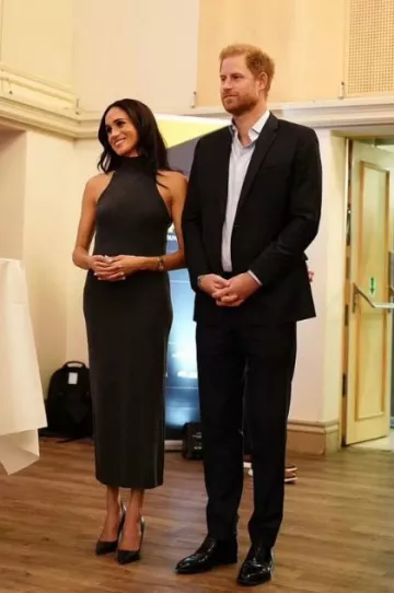 Toteme Wool Midi Dress worn by Meghan Markle at Invictus Games on September 15, 2023