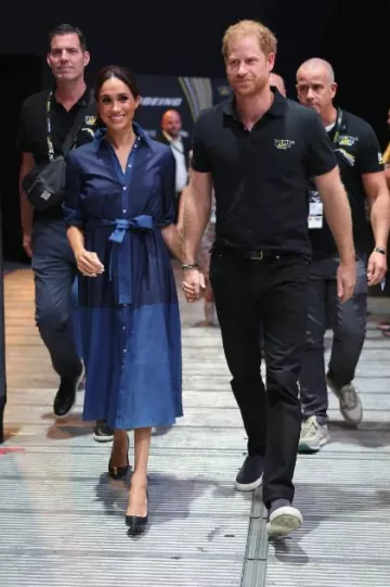 Carolina Herrera Seamed Denim Button Front Shirtdress worn by Meghan Markle at Invictus Games on September 15, 2023