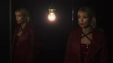 The long red leather jacket Drome worn by Angèle in her clip Démons feat. Damso