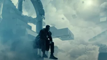 Rick Owens Black Wool Tatlin Coat worn by Sean Combs in Another One of Me [Official Music Video] by Diddy ft. The Weeknd, 21 Savage, French Montana