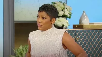 Gilet en tricot de câble métallique Zara porté par Tamron Hall tel que vu à Tamron Hall le 14 septembre 2023