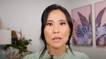 J. Crew Smocked Puff-Sleeve Top in eyelet Frosty Green worn by Vicky Nguyen as seen in Today on September 18, 2023